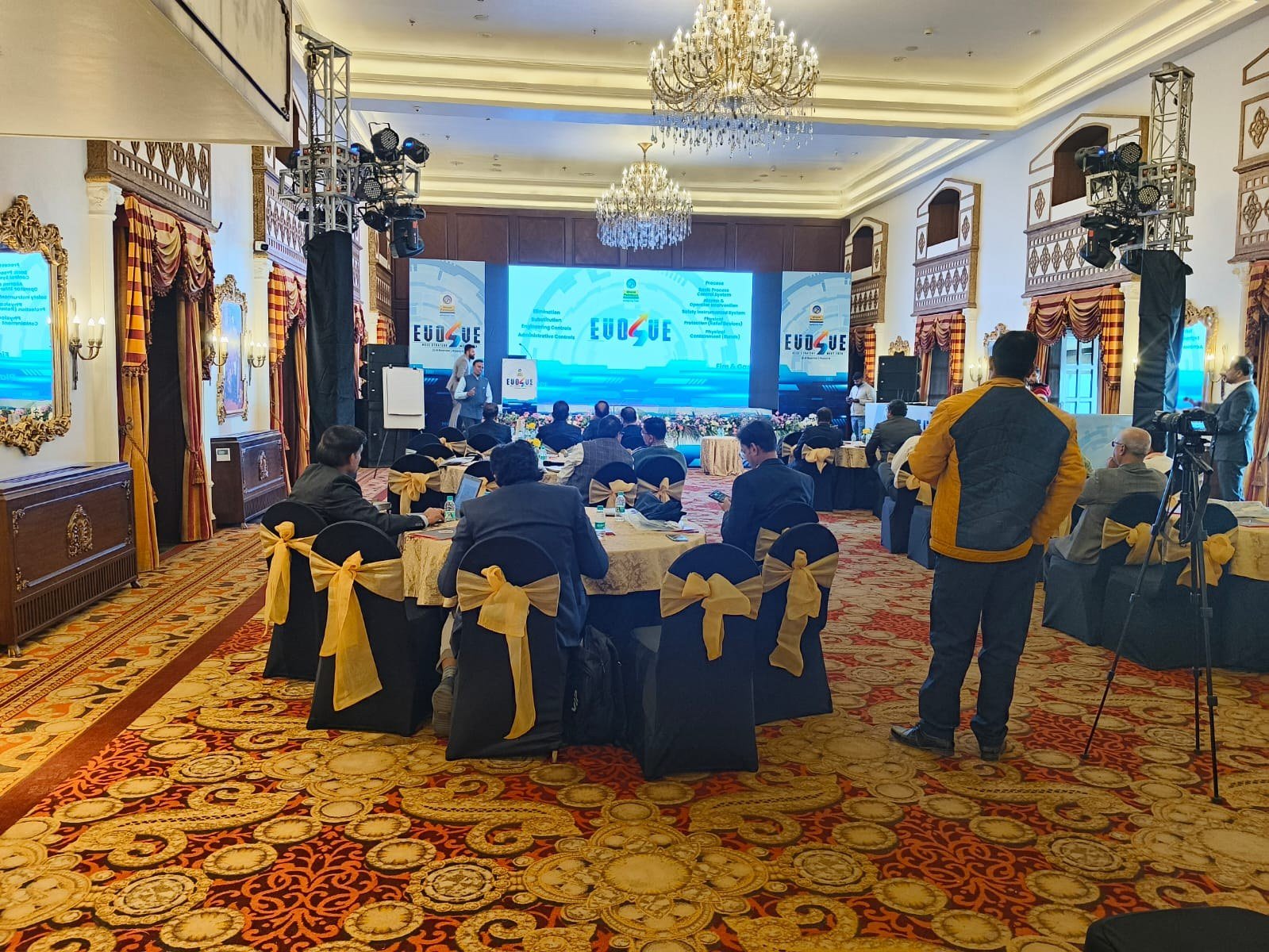 Corporate conference stage and guest seating executed by Blessings Events